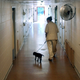 An inmate at Edna Mahan participating in the Puppies Behind Bars initiative